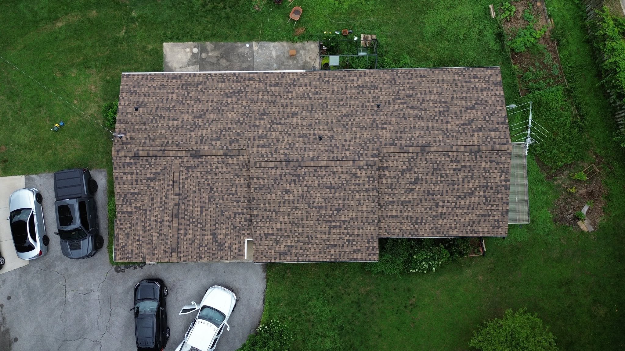 A house in construction with a grey roof